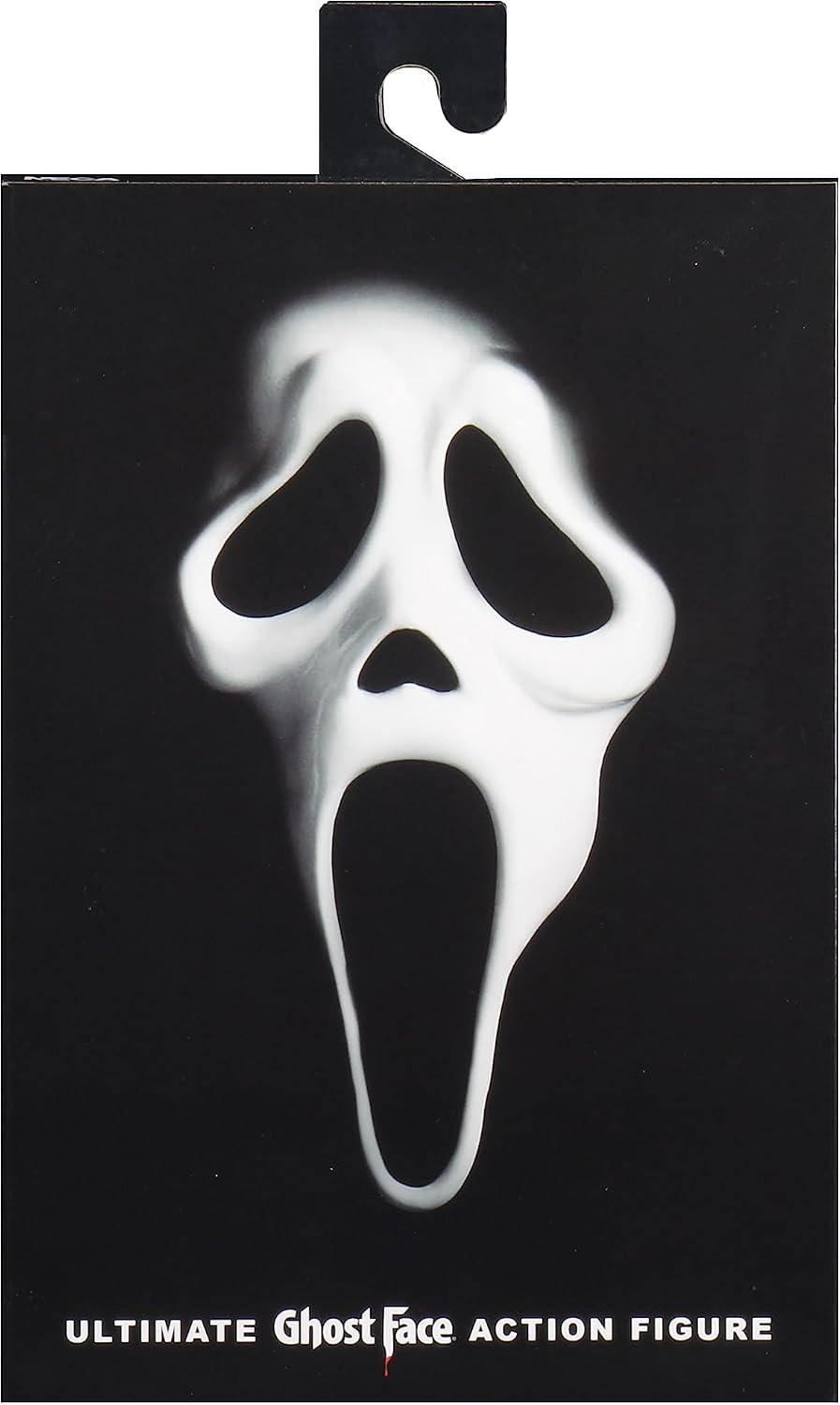 Figura coleccionable Ghostface Ultimate de NECA en su caja negra con la máscara blanca